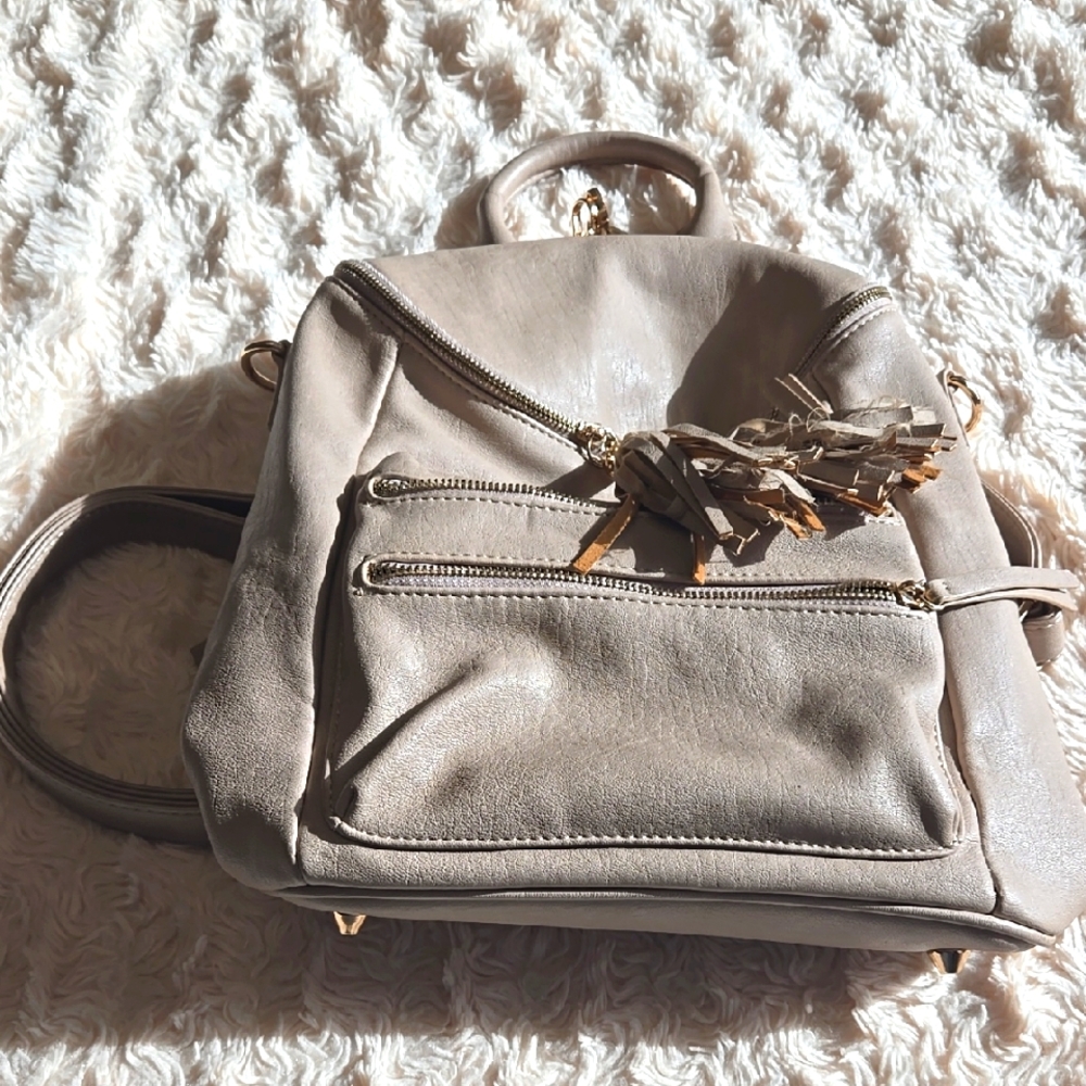 MMS Design Studio Cream Backpack with Decorative Charm and Medium Size